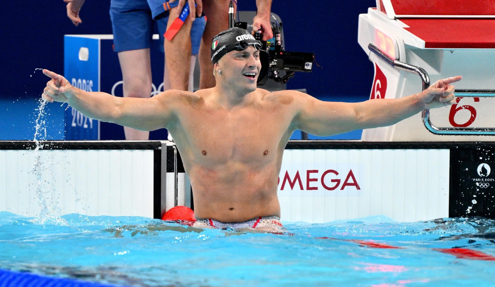 Italian Nicolo' Martinenghi celebrates after winning the gold medal in the Men's 100m Breaststroke Final of the Swimming competitions during the Paris 2024 Olympic Games at the Paris La Defense Arena in Paris, France, 28 July 2024. Summer Olympic Games wi