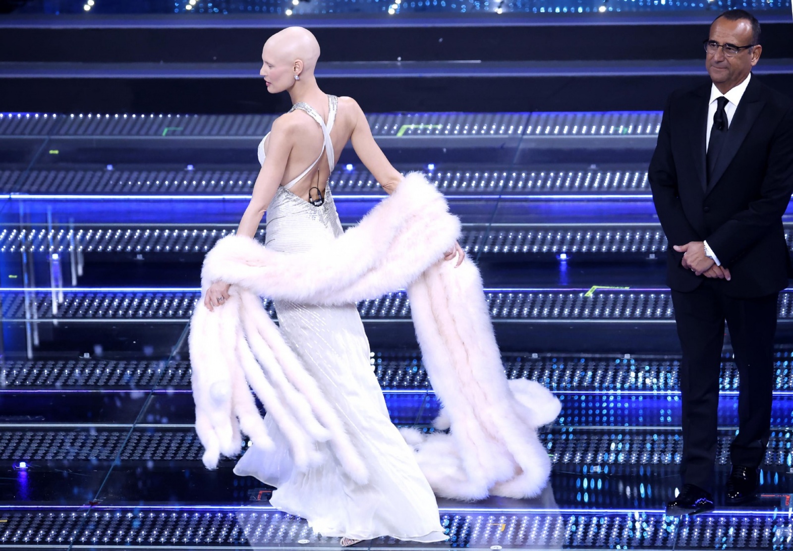 Italian model Bianca Balti and Sanremo Festival host and artistic director Carlo Conti on stage at the Ariston theatre during the 75th edition of the Sanremo Italian Song Festival, in Sanremo, Italy, 12 February 2025. The music festival will run from 11 t