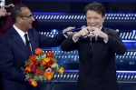 Sanremo Festival host and artistic director Carlo Conti and Italian singers Massimo Ranieri on stage at the Ariston theatre during the 75th edition of the Sanremo Italian Song Festival, in Sanremo, Italy, 14 February 2025. The music festival will run from