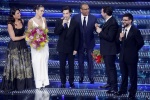 Italian actor Geppi Cucciari, Italian singer Clara, the Italian operatic pop tenors Il Volo and Sanremo Festival host and artistic director Carlo Conti on stage at the Ariston theatre during the 75th edition of the Sanremo Italian Song Festival, in Sanrem