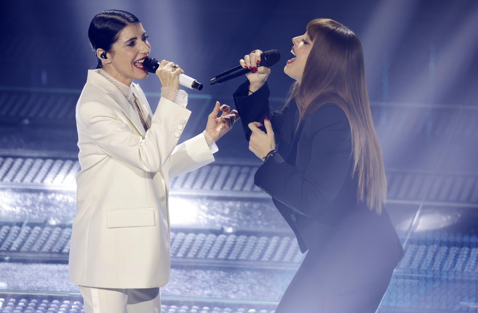 Italian singers Giorgia (L) and Annalisa perform on stage at the Ariston theatre during the 75th edition of the Sanremo Italian Song Festival, in Sanremo, Italy, 14 February 2025. The music festival will run from 11 to 15 February 2025. ANSA/FABIO FRUSTAC