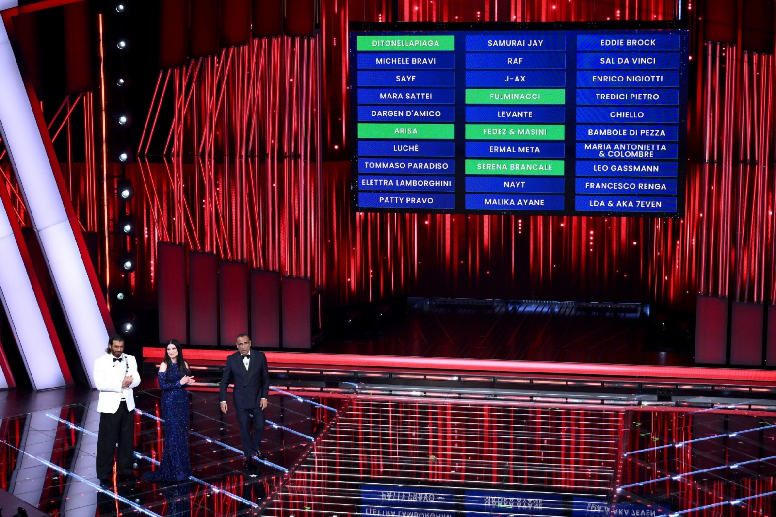 Sanremo Festival host and artistic director Carlo Conti (R) with Italian singer Laura Pausini (C) and Turkish actor Can Yaman (L) on stage at the Ariston theatre during the 76th Sanremo Italian Song Festival, Sanremo, Italy, 24 February 2026. The Music Fe