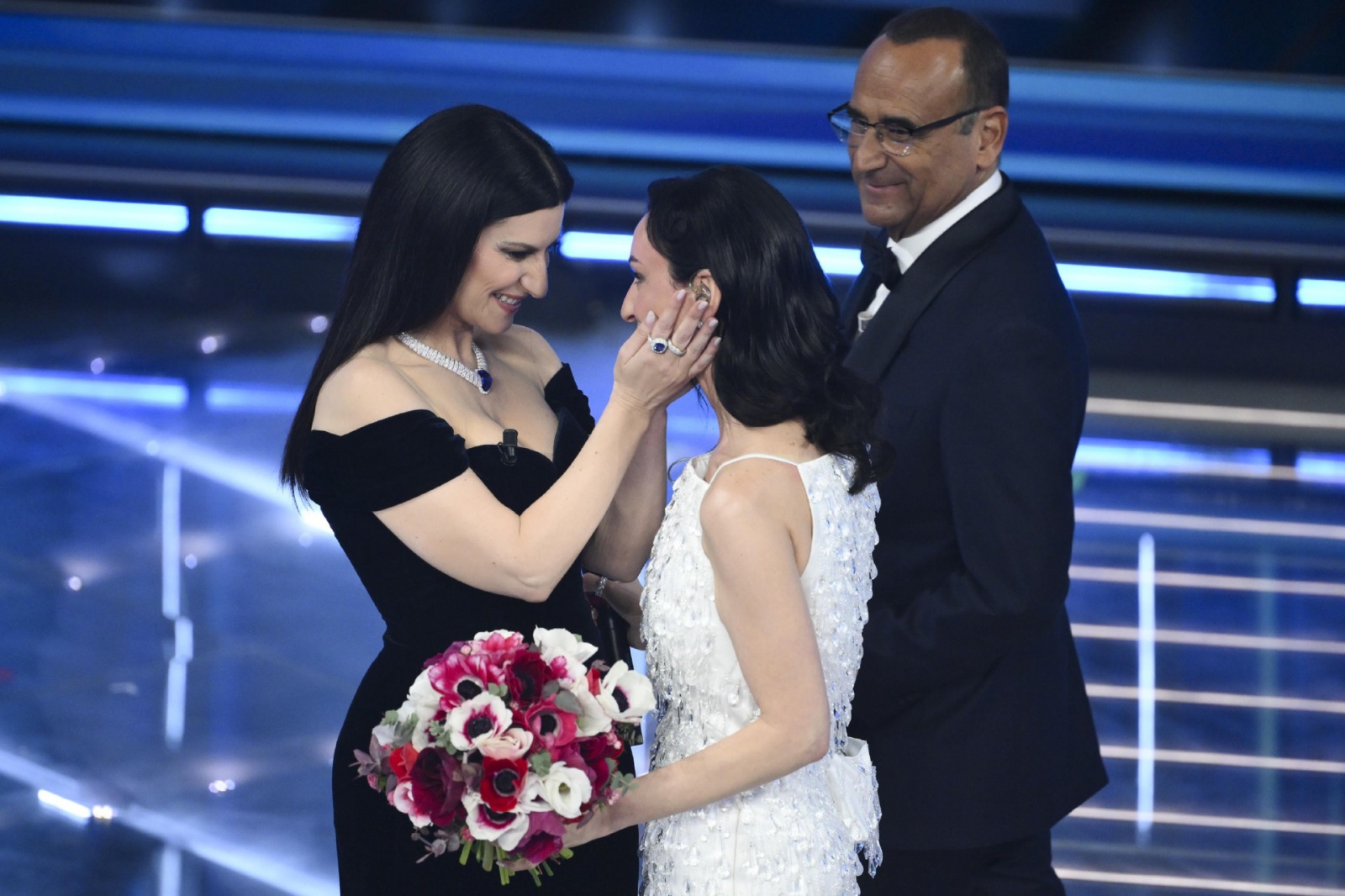 Italian singer Laura Pausini (L) with Italian singer Arisa (R) on stage at the Ariston theatre during the 76th edition of the Sanremo Italian Song Festival, in Sanremo, Italy, 24 February 2026. The music festival will run from 24 to 28 February 2026. ANSA