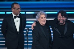 (L-R) Sanremo Festival host and artistic director Carlo Conti, Italian singer Fausto Leali and Italian actor Lillo Petrolo on stage at the Ariston theatre during the 76th edition of the Sanremo Italian Song Festival, in Sanremo, Italy, 25 February 2026. T