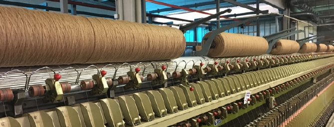 Rallentano le macchine tessili